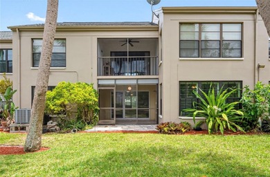 Charming and quiet 2-bedroom, 2-bath condo overlooking lush on Feather Sound Country Club in Florida - for sale on GolfHomes.com, golf home, golf lot