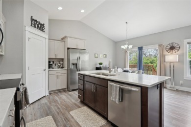 This beautiful Eco friendly ranch home features an inviting open on Woodland Hills Golf in Iowa - for sale on GolfHomes.com, golf home, golf lot