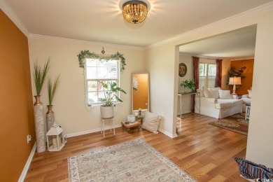 Just a short golf cart ride away from beautiful Garden City on Indigo Creek Golf Club in South Carolina - for sale on GolfHomes.com, golf home, golf lot