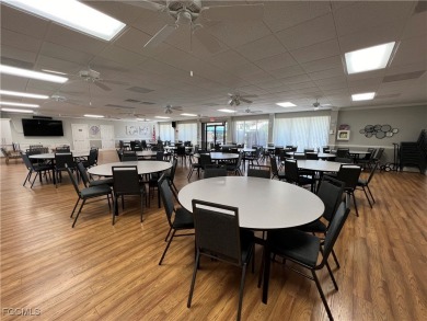 First-floor 2-bedroom, 2-bath condo located in the welcoming 55+ on Golden Gate Country Club in Florida - for sale on GolfHomes.com, golf home, golf lot