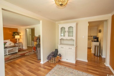 Just a short golf cart ride away from beautiful Garden City on Indigo Creek Golf Club in South Carolina - for sale on GolfHomes.com, golf home, golf lot