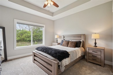 This beautiful Eco friendly ranch home features an inviting open on Woodland Hills Golf in Iowa - for sale on GolfHomes.com, golf home, golf lot