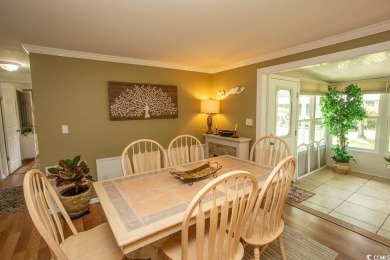 Just a short golf cart ride away from beautiful Garden City on Indigo Creek Golf Club in South Carolina - for sale on GolfHomes.com, golf home, golf lot