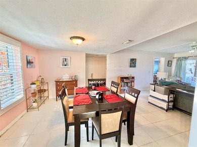 Charming and quiet 2-bedroom, 2-bath condo overlooking lush on Feather Sound Country Club in Florida - for sale on GolfHomes.com, golf home, golf lot