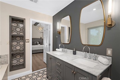 This modern hillside residence in Woodland Hills offers 4 on Woodland Hills Country Club in California - for sale on GolfHomes.com, golf home, golf lot