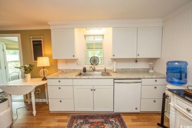Just a short golf cart ride away from beautiful Garden City on Indigo Creek Golf Club in South Carolina - for sale on GolfHomes.com, golf home, golf lot