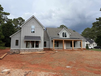 Don't miss this incredible opportunity to own a brand-new home on The Golf Club at Cuscowilla in Georgia - for sale on GolfHomes.com, golf home, golf lot