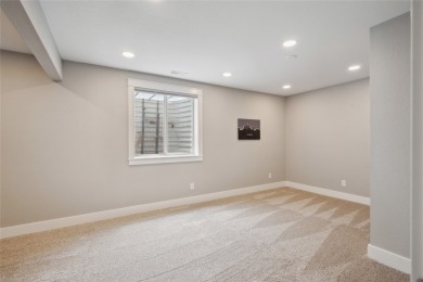 This beautiful Eco friendly ranch home features an inviting open on Woodland Hills Golf in Iowa - for sale on GolfHomes.com, golf home, golf lot