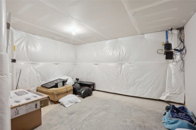 This beautiful Eco friendly ranch home features an inviting open on Woodland Hills Golf in Iowa - for sale on GolfHomes.com, golf home, golf lot
