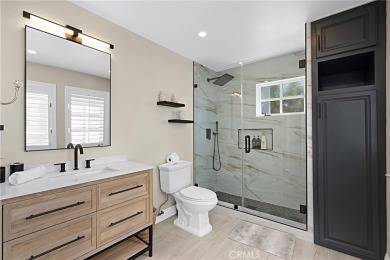 This modern hillside residence in Woodland Hills offers 4 on Woodland Hills Country Club in California - for sale on GolfHomes.com, golf home, golf lot