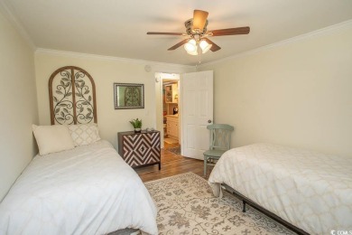 Just a short golf cart ride away from beautiful Garden City on Indigo Creek Golf Club in South Carolina - for sale on GolfHomes.com, golf home, golf lot
