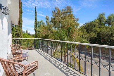 This modern hillside residence in Woodland Hills offers 4 on Woodland Hills Country Club in California - for sale on GolfHomes.com, golf home, golf lot