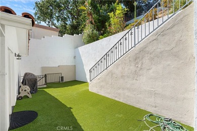 This modern hillside residence in Woodland Hills offers 4 on Woodland Hills Country Club in California - for sale on GolfHomes.com, golf home, golf lot