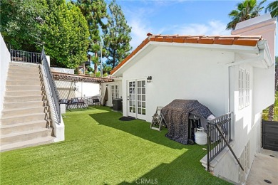 This modern hillside residence in Woodland Hills offers 4 on Woodland Hills Country Club in California - for sale on GolfHomes.com, golf home, golf lot