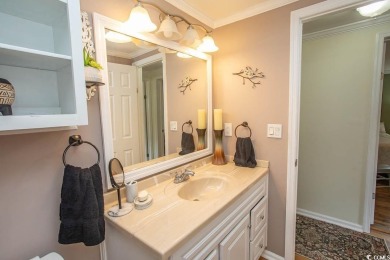 Just a short golf cart ride away from beautiful Garden City on Indigo Creek Golf Club in South Carolina - for sale on GolfHomes.com, golf home, golf lot