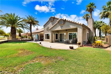 Nestled between the majestic backdrop of golf course greens and on Mojave Resort Golf Club in Nevada - for sale on GolfHomes.com, golf home, golf lot