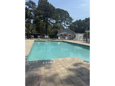 Just a short golf cart ride away from beautiful Garden City on Indigo Creek Golf Club in South Carolina - for sale on GolfHomes.com, golf home, golf lot