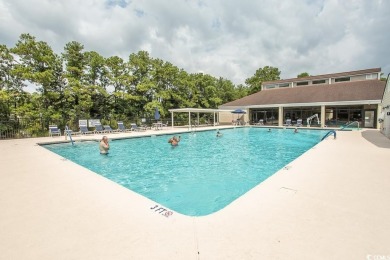 Just a short golf cart ride away from beautiful Garden City on Indigo Creek Golf Club in South Carolina - for sale on GolfHomes.com, golf home, golf lot