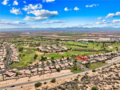 Nestled between the majestic backdrop of golf course greens and on Mojave Resort Golf Club in Nevada - for sale on GolfHomes.com, golf home, golf lot