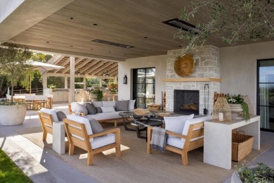 A masterful expression of timeless French country elegance on Rancho Santa Fe Golf Club in California - for sale on GolfHomes.com, golf home, golf lot