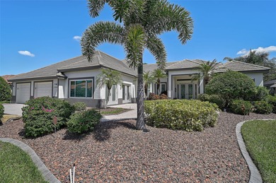 Discover refined living in this expansive Calusa Lakes estate on Calusa Lakes Golf Club in Florida - for sale on GolfHomes.com, golf home, golf lot