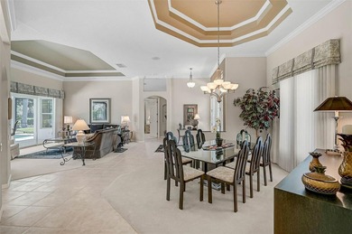 Discover refined living in this expansive Calusa Lakes estate on Calusa Lakes Golf Club in Florida - for sale on GolfHomes.com, golf home, golf lot