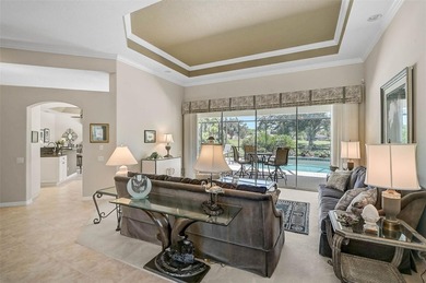 Discover refined living in this expansive Calusa Lakes estate on Calusa Lakes Golf Club in Florida - for sale on GolfHomes.com, golf home, golf lot