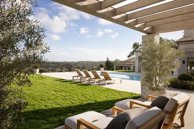 Some homes are beautiful. Some homes are impressive.  And then on Rancho Santa Fe Golf Club in California - for sale on GolfHomes.com, golf home, golf lot