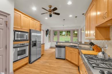 To see this amazing home, call Camen Stroud, The Stroud Team at on The Cliffs Valley Golf Course in South Carolina - for sale on GolfHomes.com, golf home, golf lot