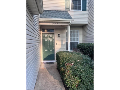 Charming 3-bedroom, 1.5-bathroom water view townhouse in the on Kiln Creek Golf and Country Club in Virginia - for sale on GolfHomes.com, golf home, golf lot