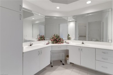 Top-Floor End Unit with Rare 2.5-Car Garage in Pebble Creek at on Club at Pelican Bay Golf Course in Florida - for sale on GolfHomes.com, golf home, golf lot