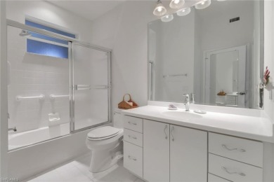 Top-Floor End Unit with Rare 2.5-Car Garage in Pebble Creek at on Club at Pelican Bay Golf Course in Florida - for sale on GolfHomes.com, golf home, golf lot