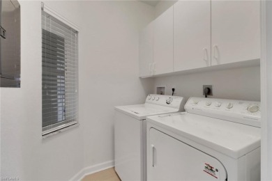 Top-Floor End Unit with Rare 2.5-Car Garage in Pebble Creek at on Club at Pelican Bay Golf Course in Florida - for sale on GolfHomes.com, golf home, golf lot