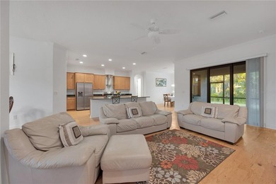 Tucked inside the tranquil and golf-cart-friendly community of on The Golf Club of Cypress Creek in Florida - for sale on GolfHomes.com, golf home, golf lot