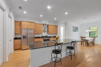 Tucked inside the tranquil and golf-cart-friendly community of on The Golf Club of Cypress Creek in Florida - for sale on GolfHomes.com, golf home, golf lot