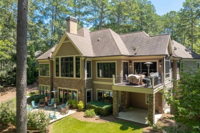 Experience refined golf living in this custom-built home located on Reynolds Lake Oconee - The Oconee in Georgia - for sale on GolfHomes.com, golf home, golf lot