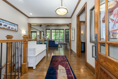 Experience refined golf living in this custom-built home located on Reynolds Lake Oconee - The Oconee in Georgia - for sale on GolfHomes.com, golf home, golf lot