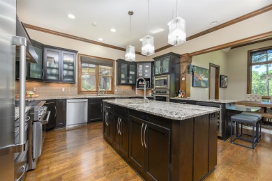 Experience refined golf living in this custom-built home located on Reynolds Lake Oconee - The Oconee in Georgia - for sale on GolfHomes.com, golf home, golf lot