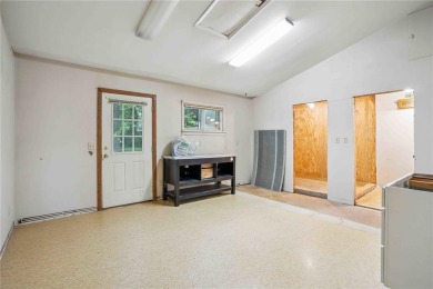 Endless Potential! Fixer-Upper Opportunity Close to Lake on Lake McBride Golf Course in Iowa - for sale on GolfHomes.com, golf home, golf lot