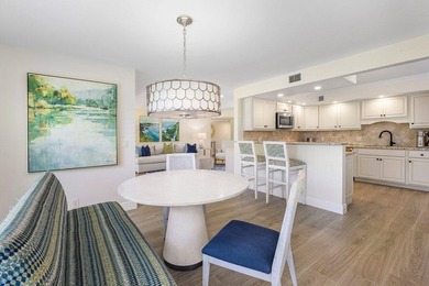 Experience the convenience of this renovated first-floor corner on Quail Ridge Golf Course and Country Club in Florida - for sale on GolfHomes.com, golf home, golf lot