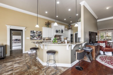 Beautiful one-story Lake Maria home built by Carriage Custom on Isabella Golf Course  in Arkansas - for sale on GolfHomes.com, golf home, golf lot
