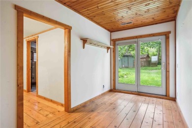 Endless Potential! Fixer-Upper Opportunity Close to Lake on Lake McBride Golf Course in Iowa - for sale on GolfHomes.com, golf home, golf lot