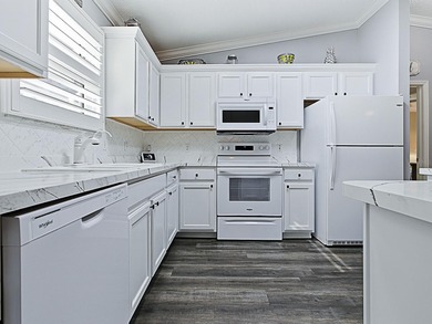 Welcome home to this meticulously maintained 3 BR AMARILLO model on El Diablo Executive Golf Course in Florida - for sale on GolfHomes.com, golf home, golf lot