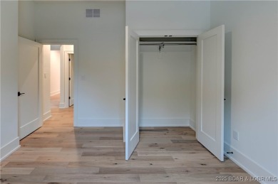 New Construction! This luxurious reverse  1.5 story 5 bedroom/3 on The Club At Porto Cima in Missouri - for sale on GolfHomes.com, golf home, golf lot