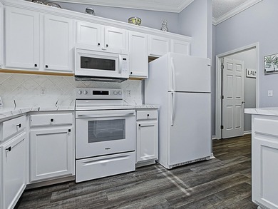 Welcome home to this meticulously maintained 3 BR AMARILLO model on El Diablo Executive Golf Course in Florida - for sale on GolfHomes.com, golf home, golf lot