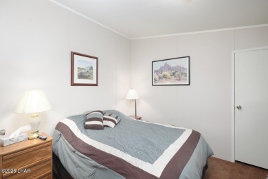 Step into this furnished 3-bedroom, 2-bath manufactured home on The Refuge Golf and Country Club in Arizona - for sale on GolfHomes.com, golf home, golf lot
