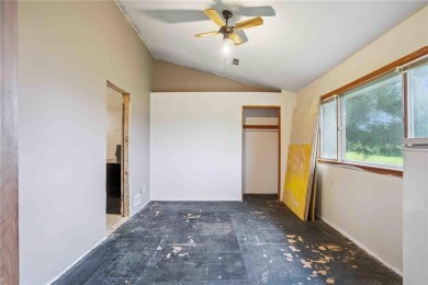 Endless Potential! Fixer-Upper Opportunity Close to Lake on Lake McBride Golf Course in Iowa - for sale on GolfHomes.com, golf home, golf lot