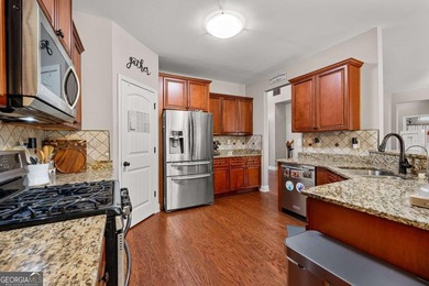 Beautiful four-bedroom, three-bath home located in the highly on Summergrove Golf Club in Georgia - for sale on GolfHomes.com, golf home, golf lot