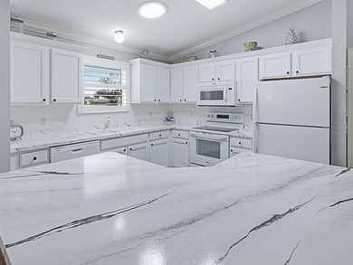 Welcome home to this meticulously maintained 3 BR AMARILLO model on El Diablo Executive Golf Course in Florida - for sale on GolfHomes.com, golf home, golf lot