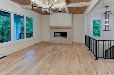 New Construction! This luxurious reverse  1.5 story 5 bedroom/3 on The Club At Porto Cima in Missouri - for sale on GolfHomes.com, golf home, golf lot